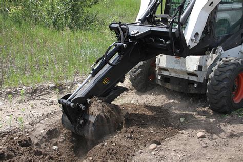 digging a pool with a skid steer|digging holes with skid steer.